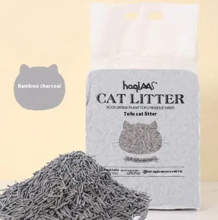 Healthy cat enjoying Eco-Friendly Tofu Cat Litter in a clean litter box, emphasizing the comfort and satisfaction for both cats and owners.